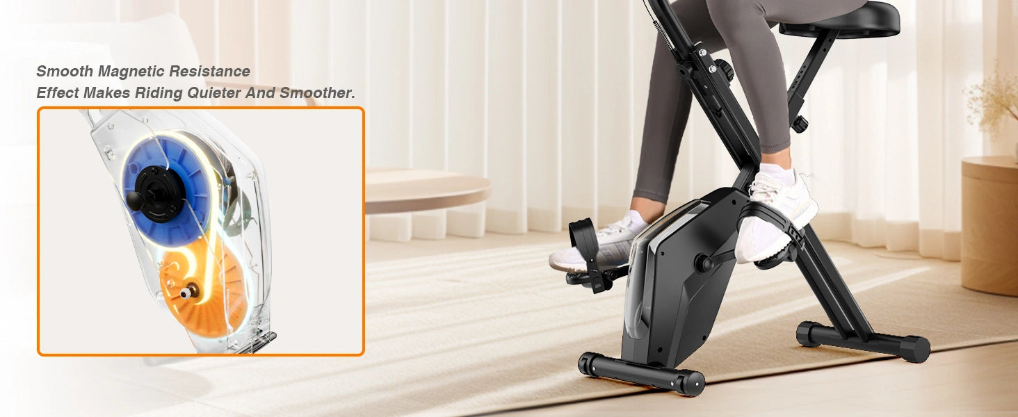 Persona que utiliza una bicicleta estática con resistencia magnética con un primer plano del mecanismo de resistencia.